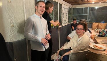 Southern Fellows and teens spending time in the Sukkah